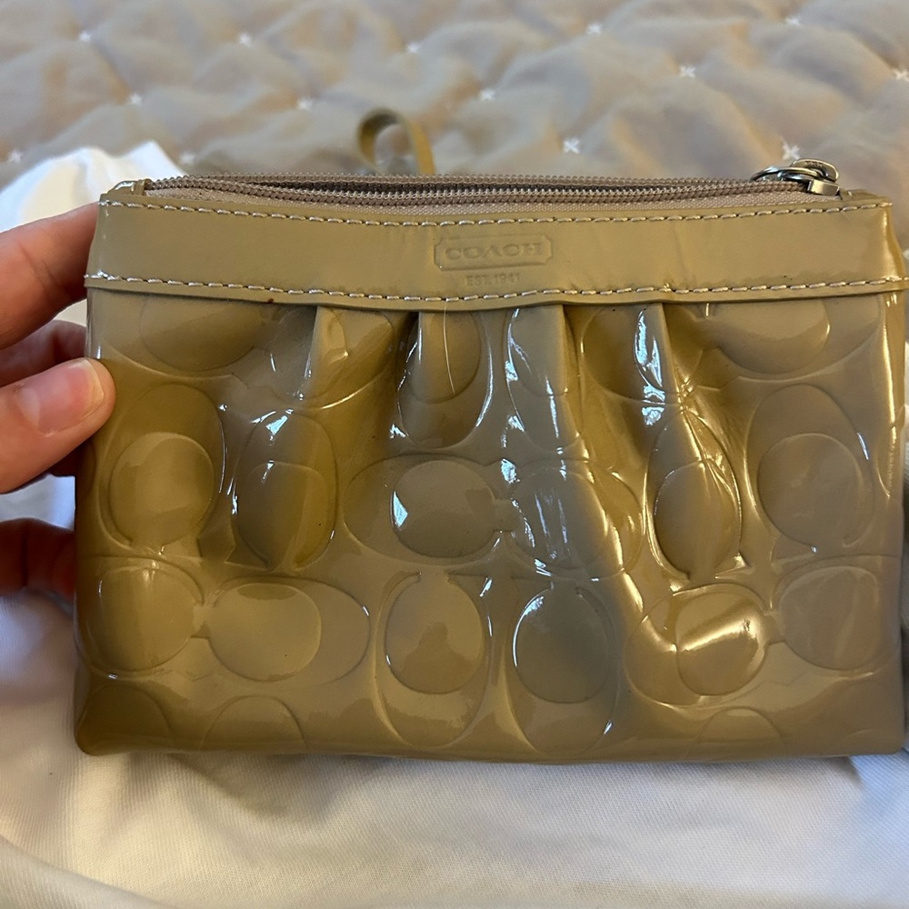 Coach Glossy Tan Embossed Clutch